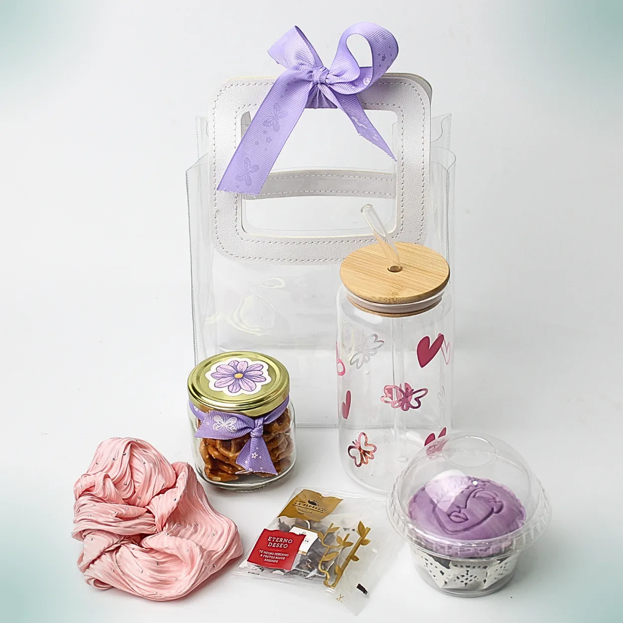 Kit Tea & freshness Pack de regalo con vaso de vidrio, tapa de bambú, cupcake lila y snacks en bolso transparente con lazo morado